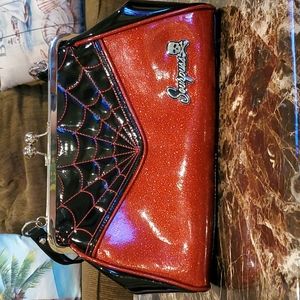 Sourpuss purse and wallet. Black and red spiderweb.